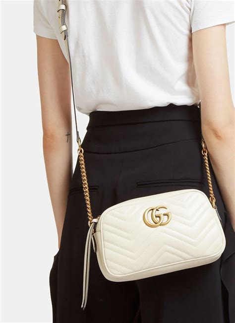 GG Marmont small shoulder bag in ivory tweed 